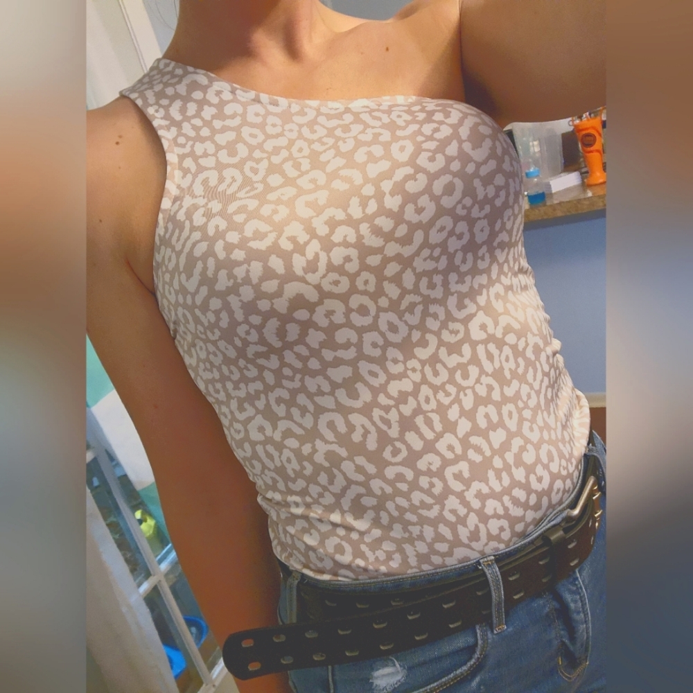 One shoulder, cheetah print body suit.